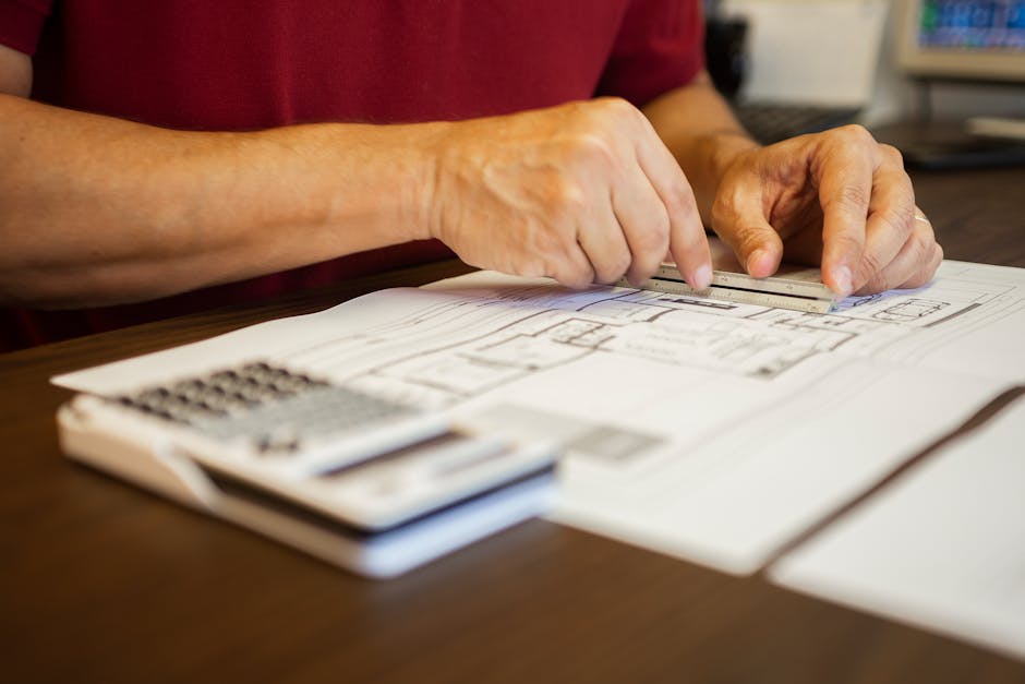 Construction estimate and planning with blueprints for professional home addition